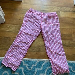 Pink and white striped pajama bottoms